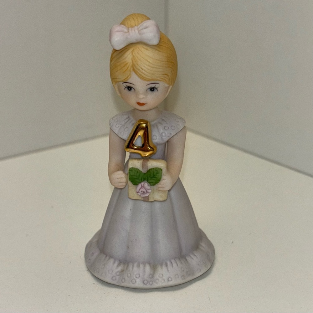 Enesco 1981 bisque porcelain “Growing Up Birthday Girls” age 4 figurine.